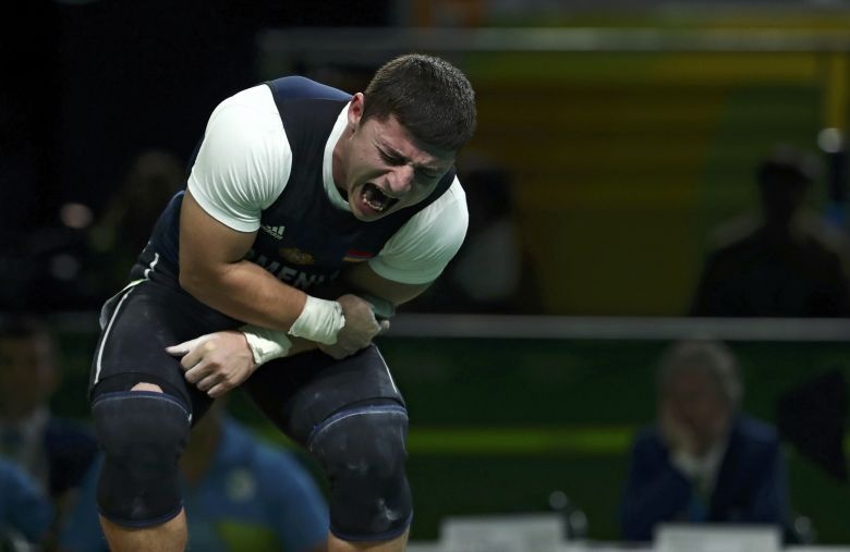 2016 08 10T232910Z 1417151570 RIOEC8A1T8LUL RTRMADP 3 OLYMPICS RIO WEIGHTLIFTING M 77KG