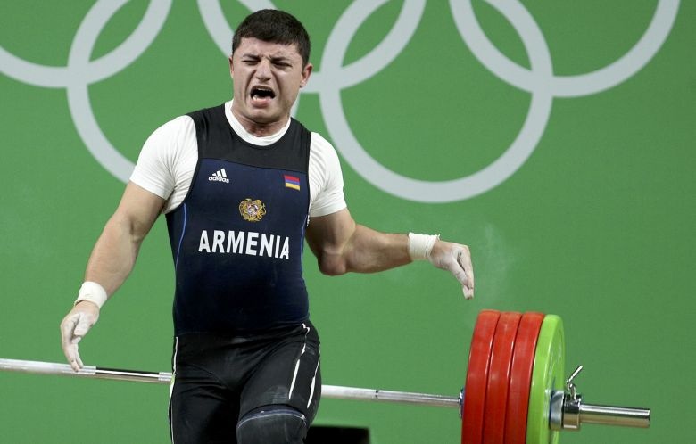 2016 08 10T233458Z 1877479915 RIOEC8A1TI9W0 RTRMADP 3 OLYMPICS RIO WEIGHTLIFTING M 77KG