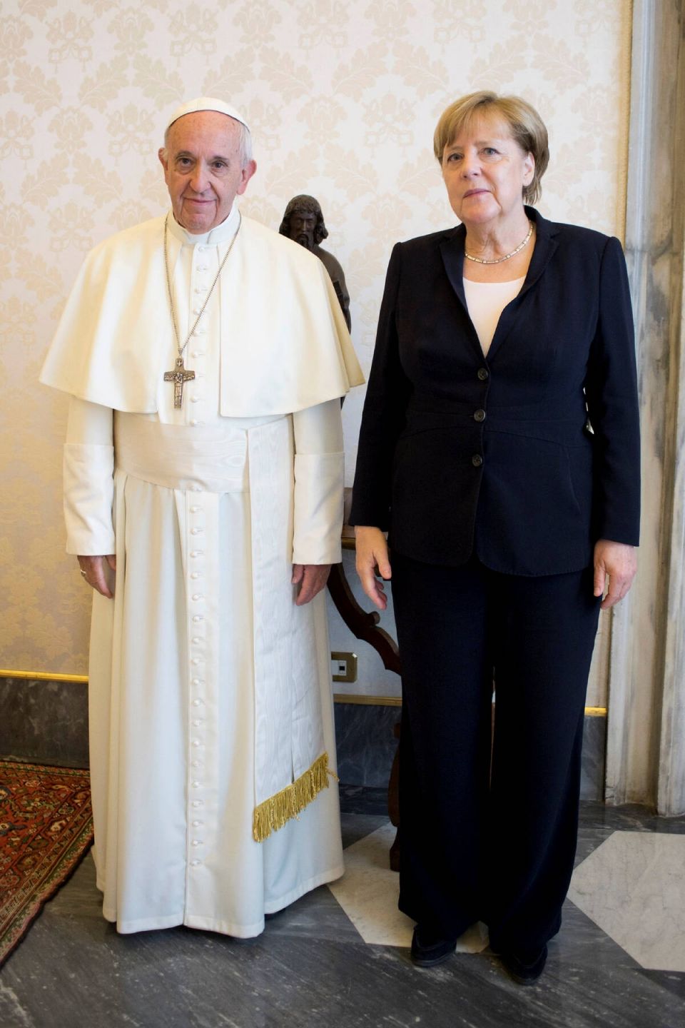 2017-06-17T121748Z 231050354 RC1B642D7830 RTRMADP 3 POPE-MERKEL