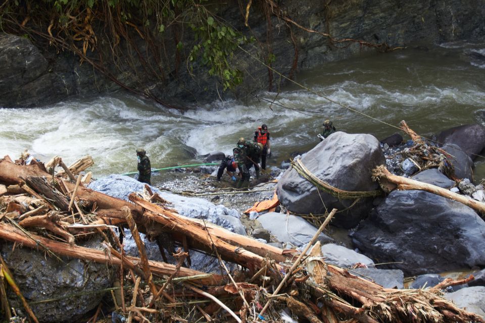 CORRECTION Indonesia Extreme Weather Asia Flooding