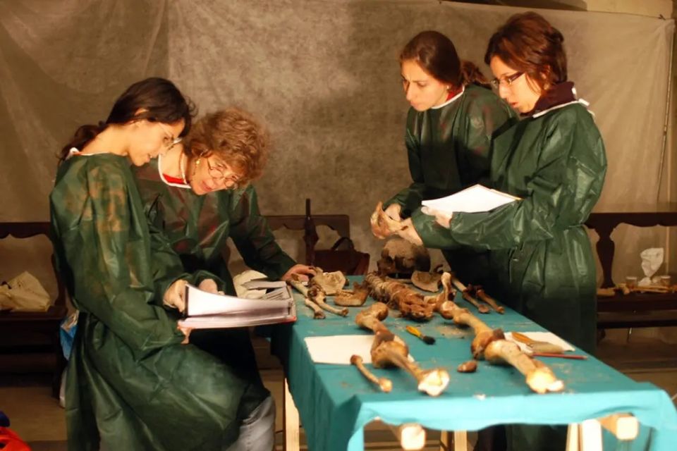pictured-researches-analyzing-remains-brothers-133041493.jpg